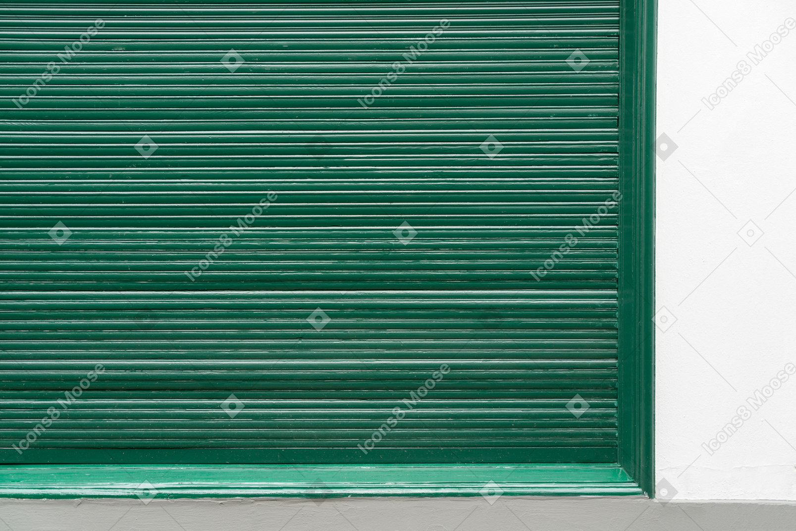 Green door and white wall