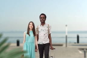 Interracial couple looking forward to happy vacation