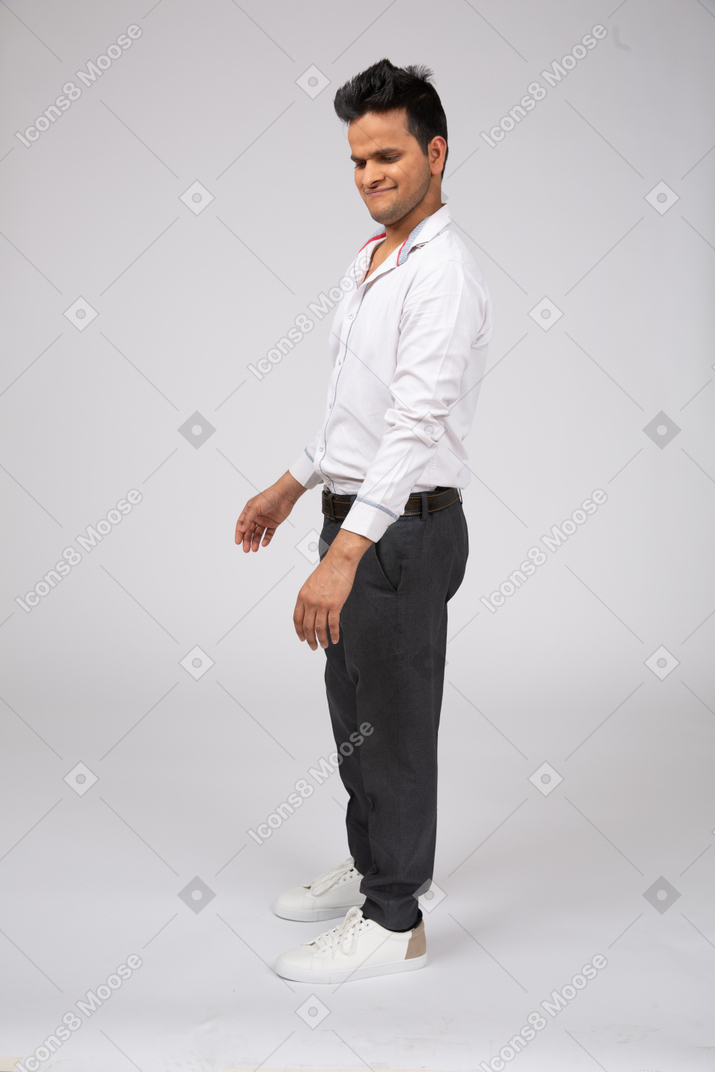 Man in white shirt standing