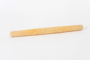 Rolling pin on white background