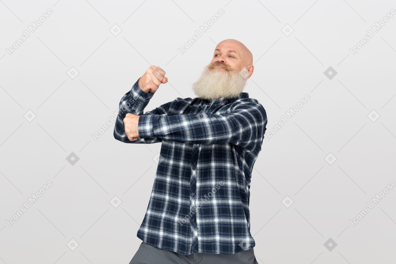 Mature bearded man pretending to carry something