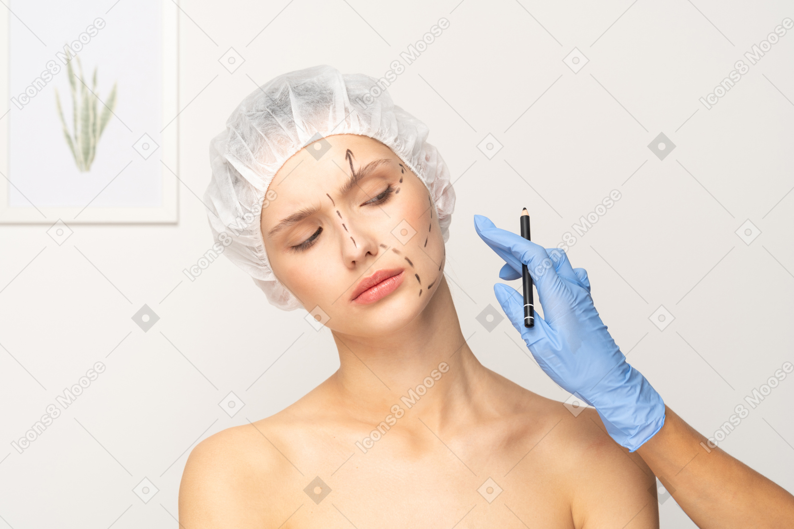 Young woman with face markings preparing for surgery