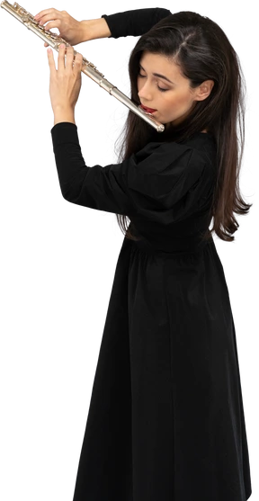Three-quarter view of a serious young lady in black dress playing the flute