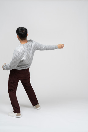 Man in casual clothes dancing