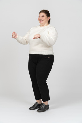 Happy plus size woman in casual clothes