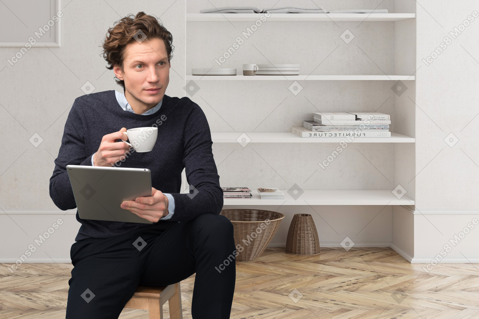 A man sitting on a stool holding a cup of coffee