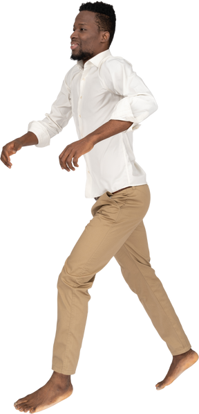 Man in white shirt jumping