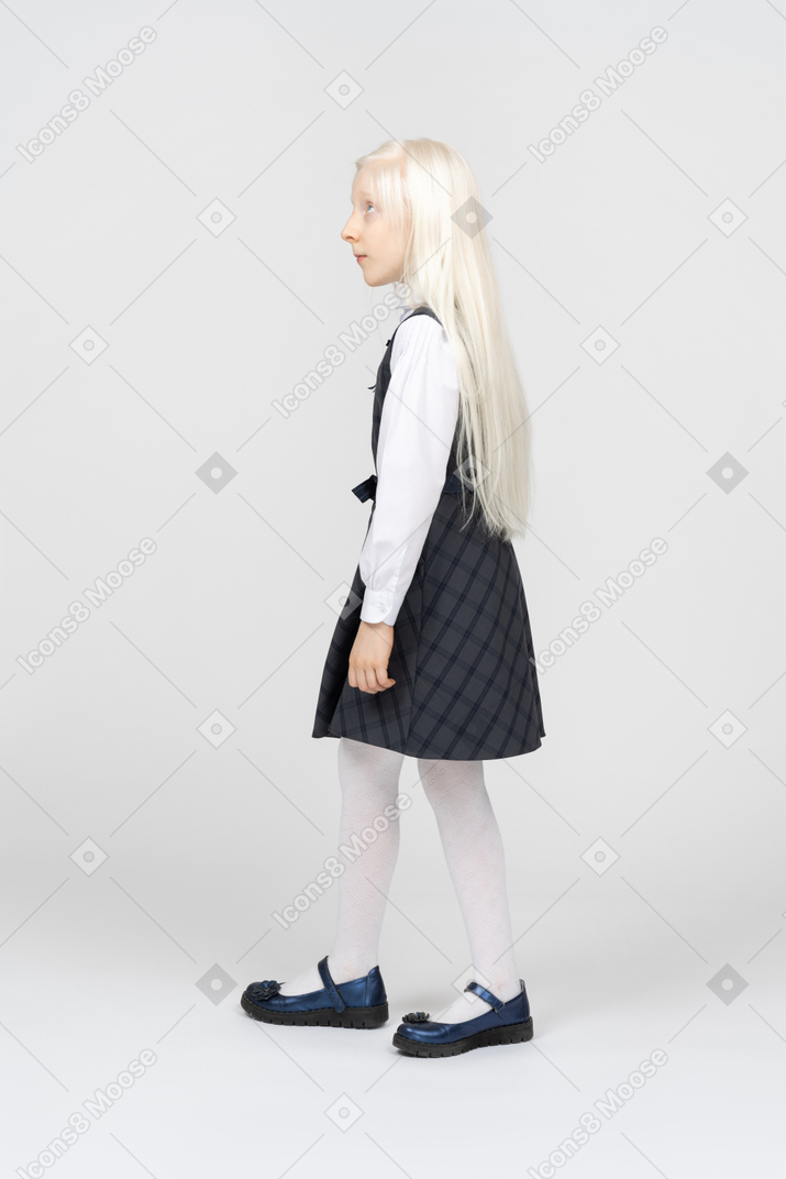 Side view of a schoolgirl