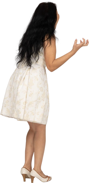 Woman in beautiful dress standing