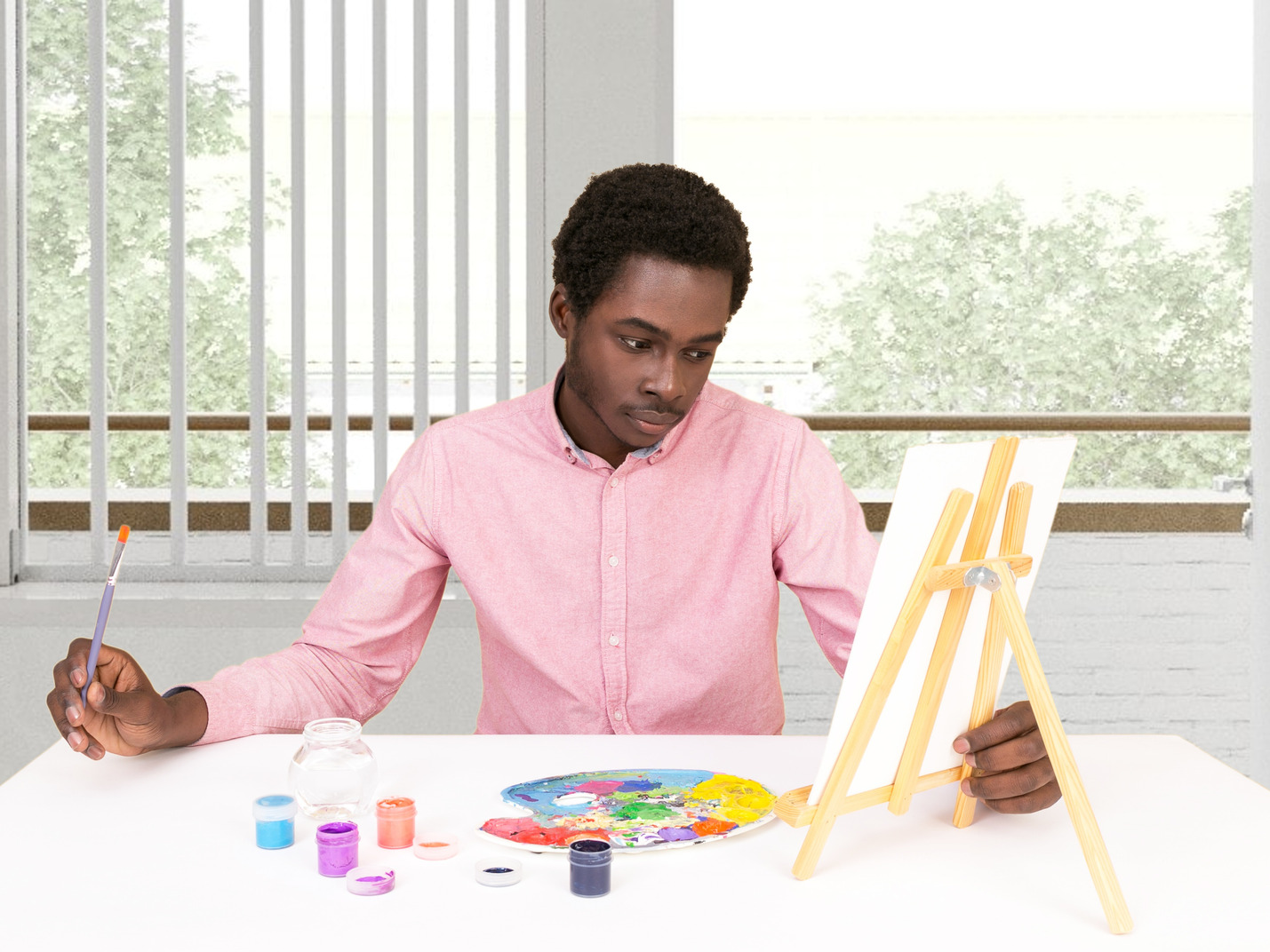 Young man drawing a picture with pencil