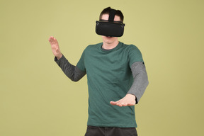 Young man experiencing virtual reality