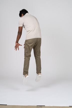 Man in casual clothes jumping