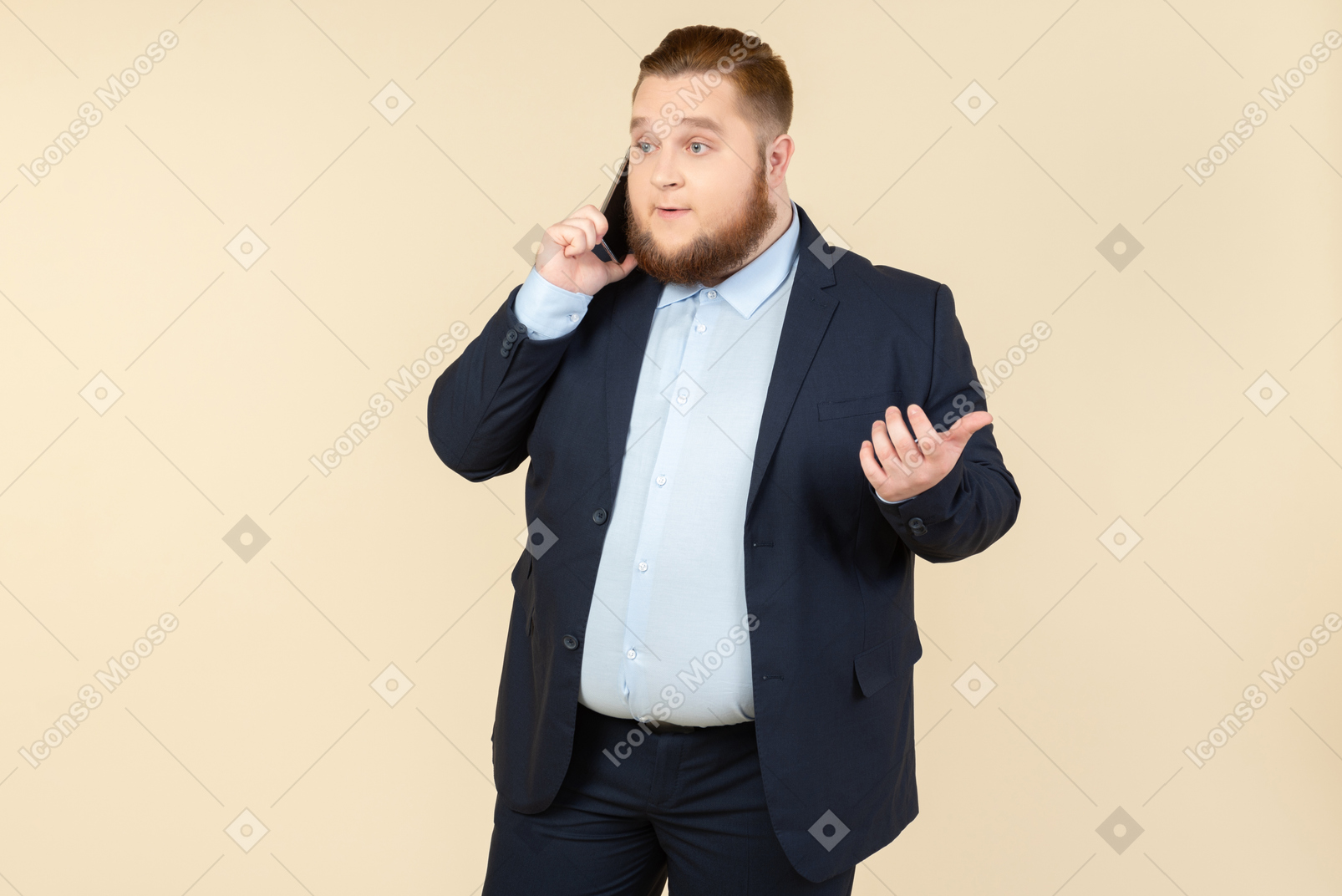Surprised young overweight office worker talking on the phone