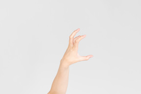 Female hand showing kind of scary gesture