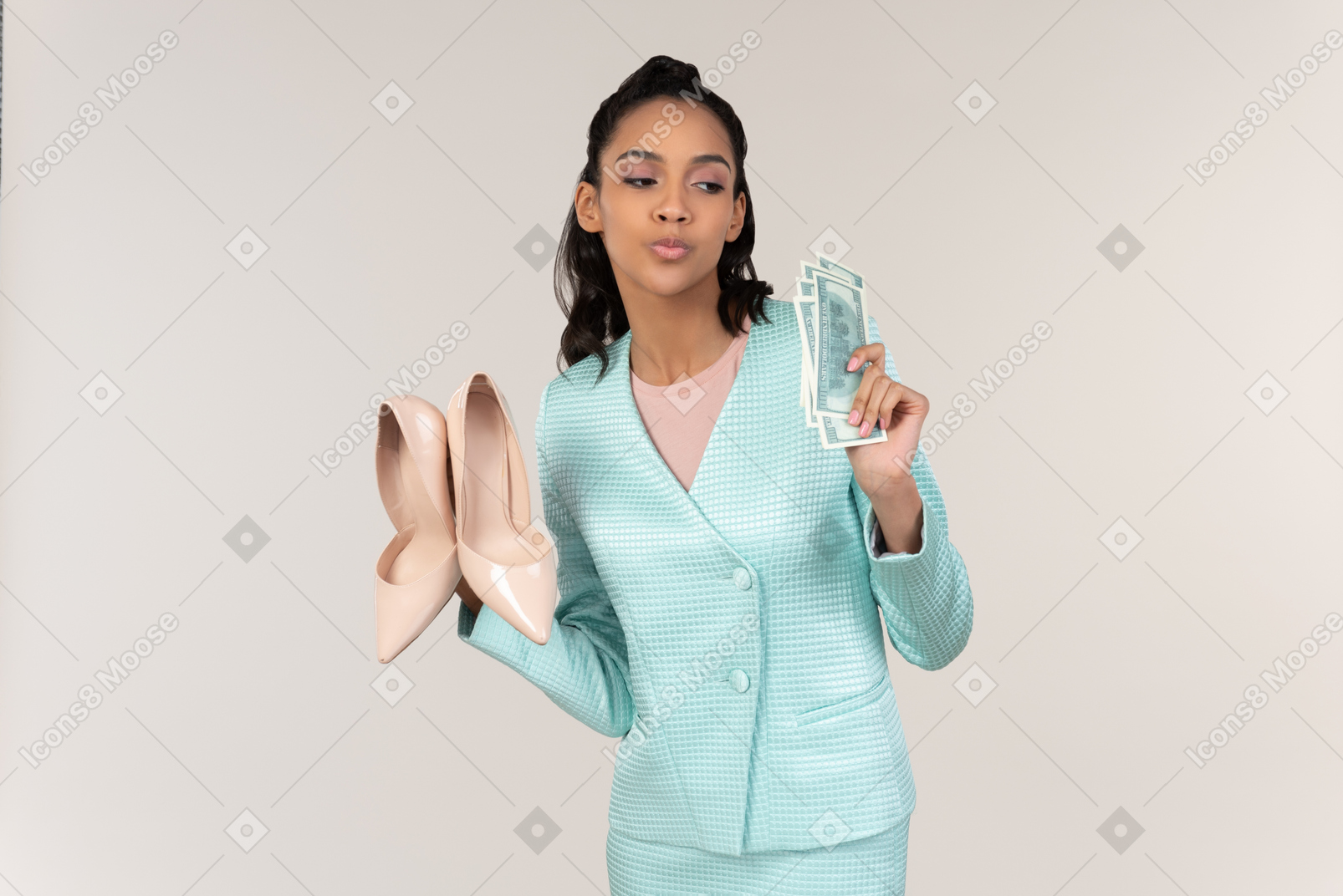 Catchy young afrowoman holding money bills and beige heels