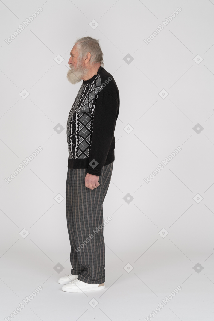 Side view of old man standing upright