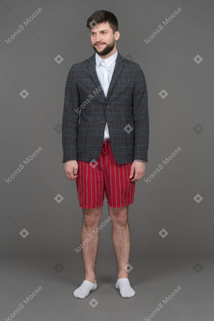 Full length portrait of a cheerful half dressed office worker