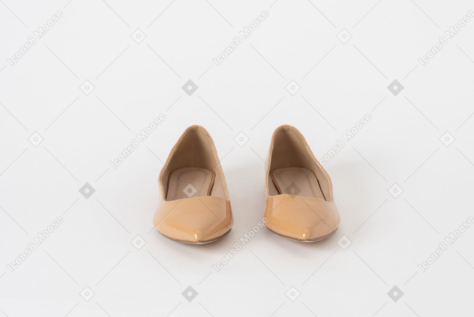 A front shot of a pair of beige lacquer low heel shoes