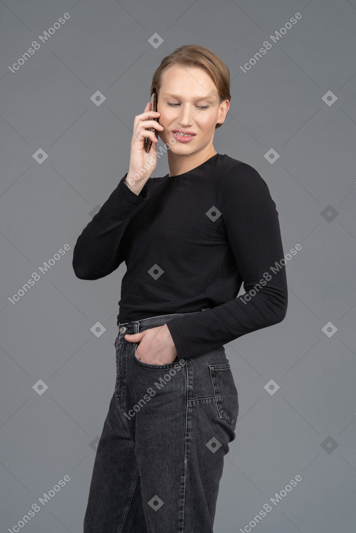 Side view of a person making a call
