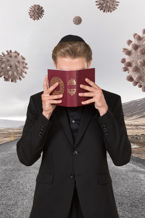 Man reading a spell against the viruses