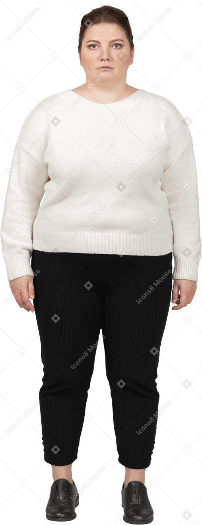 Plump woman in casual clothes looking at camera