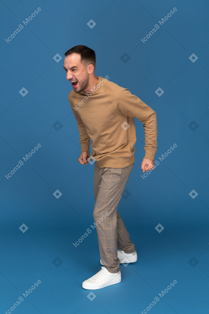 Angry young man shouting