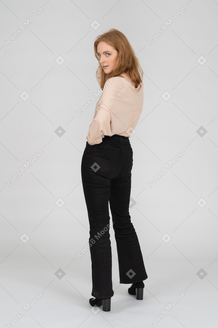 Woman in beautiful blouse standing