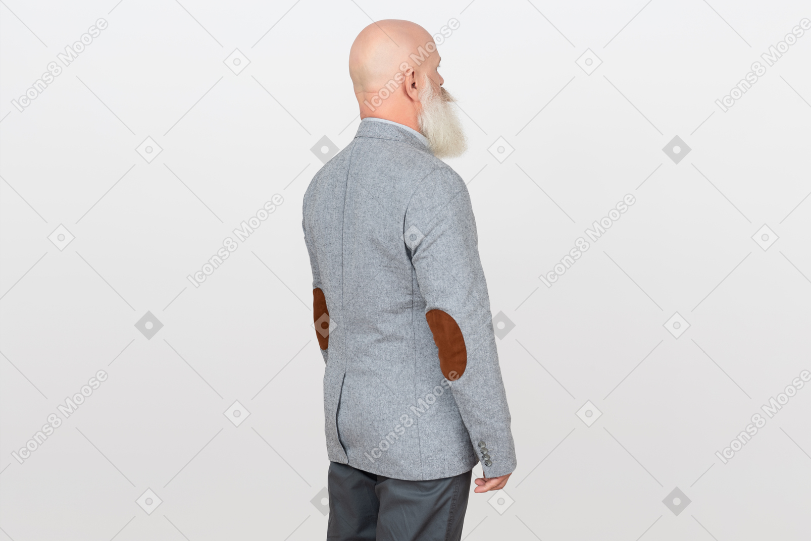 Older bald man with white beard standing side back to camera