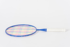 Blue tennis racket on a white background