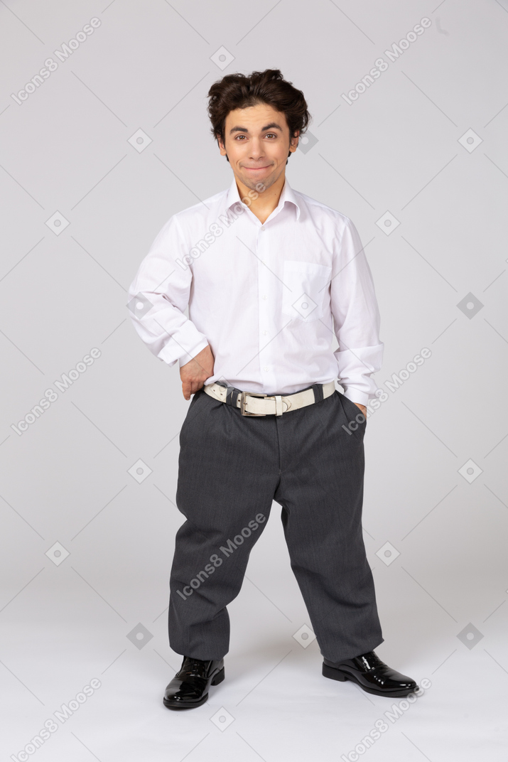 Man with hand on hip smiling