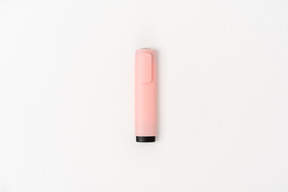 Pink colorful pen on white background