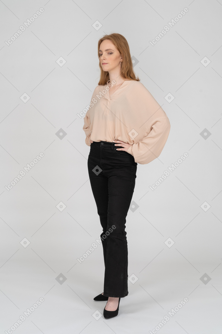 Woman in beautiful blouse standing