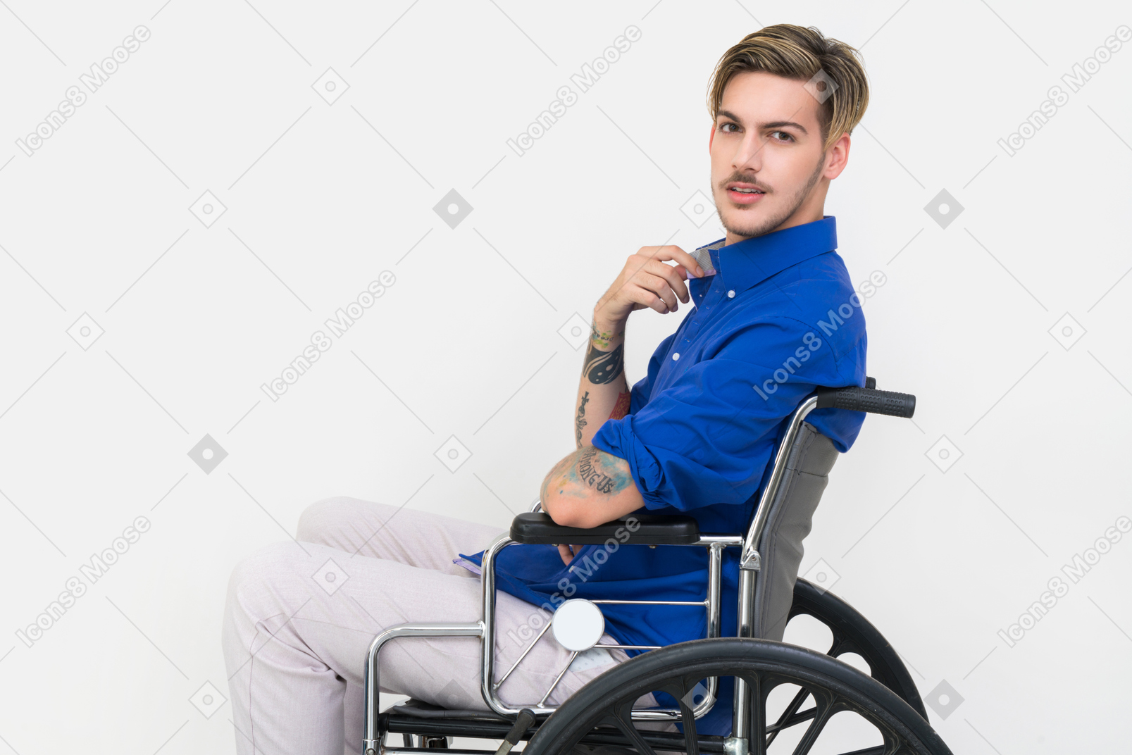 Young handsome man in a wheelchair