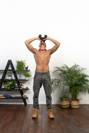 Good looking young man with binoculars