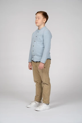 Side view of a boy with closed eyes