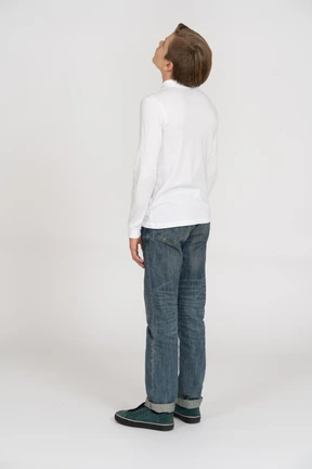 Young man in casual clothes standing