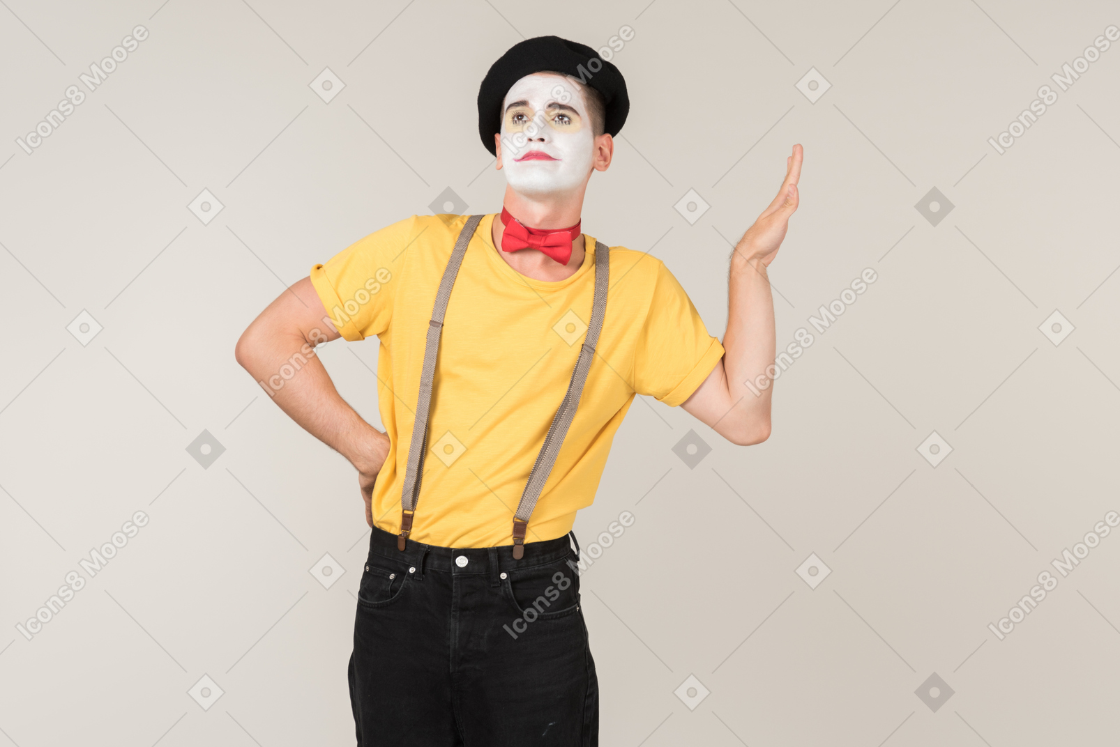 Male mime standing like he doesn't care about anything