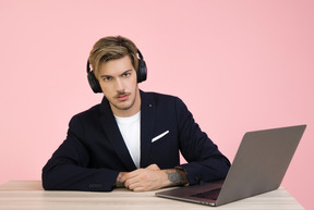 Good looking young man in headphones