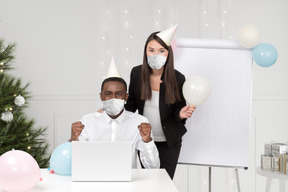 Young socially responsible couple celebrating christmas