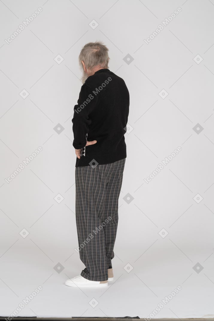 Old man standing akimbo