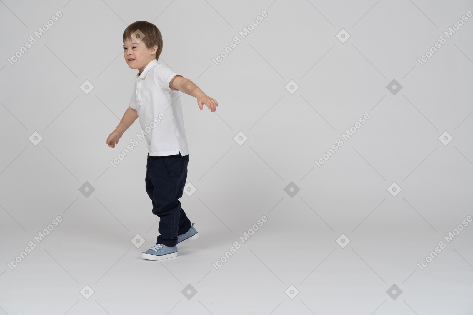 Side view of a boy playing around