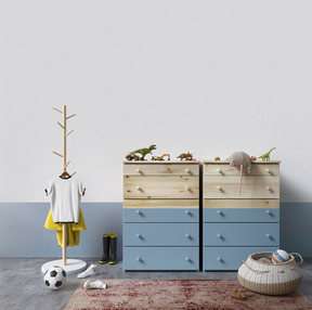Room with chest of drawers and children's toys
