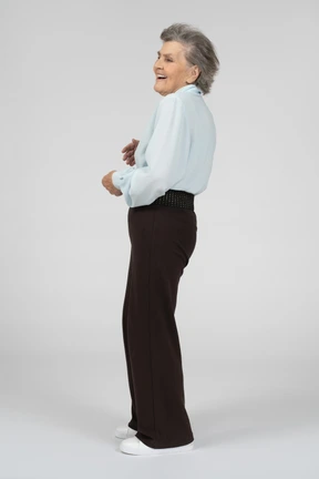 Side view of an old woman laughing