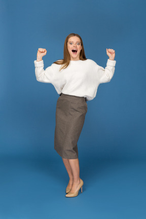 Young businesswoman being joyful