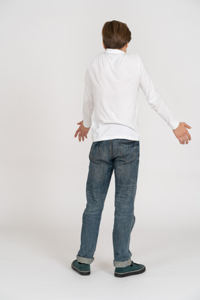 Young man in casual clothes standing