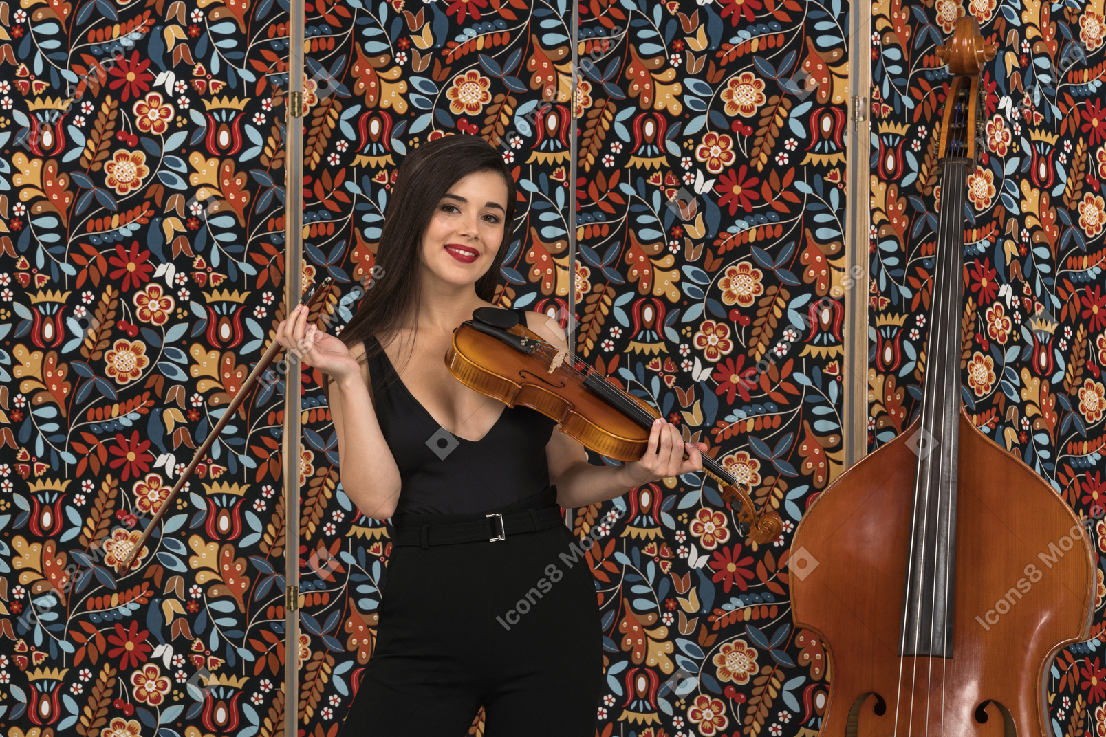 Charming female violinist facing the camera