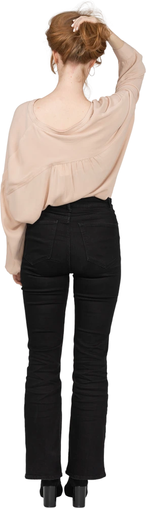 Woman in beautiful blouse standing