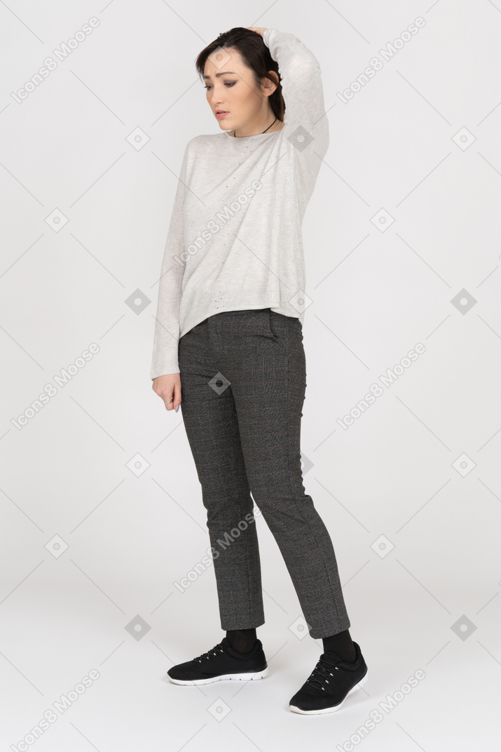 Frustrated young woman isolated over white background