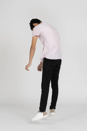 Man in casual clothes jumping