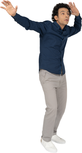 Front view of a man in casual clothes dancing